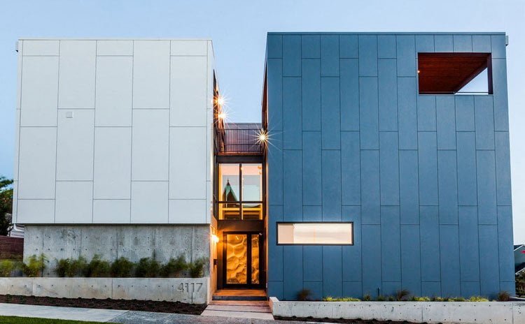 Edificio residencial de estilo industrial con una fachada de paneles poliméricos - paneles de fachada raros