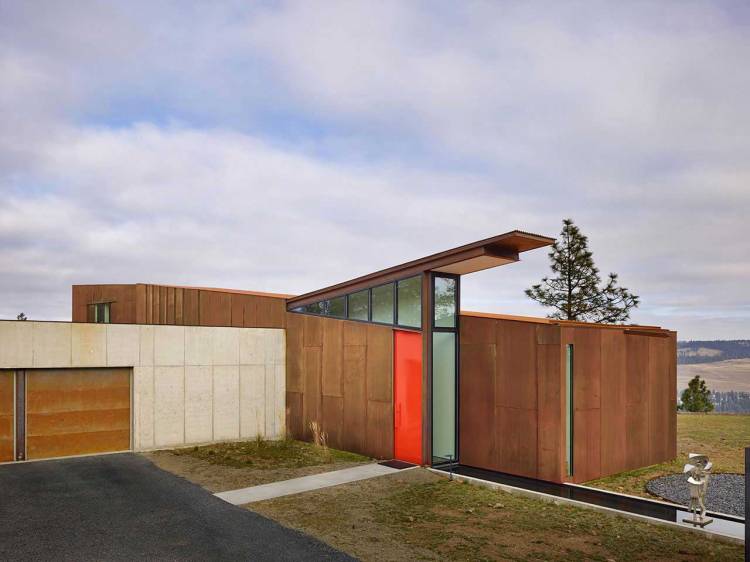 Металл + Стекло = Великолепный дизайн фасада загородного дома на фото