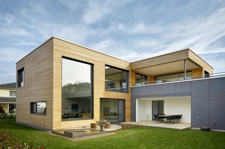 Ideia extravagante de uma fachada aberta de uma casa moderna