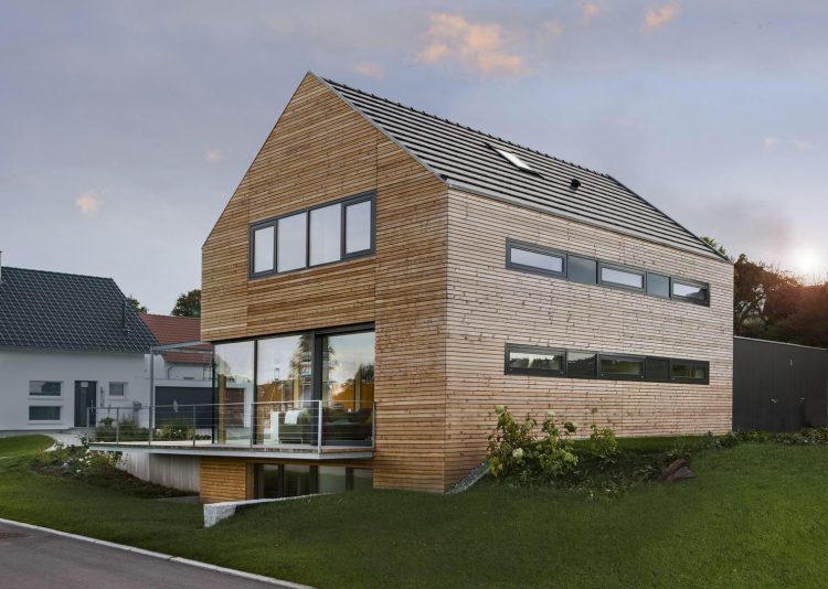 Stylish exterior design of a wooden house is laconic