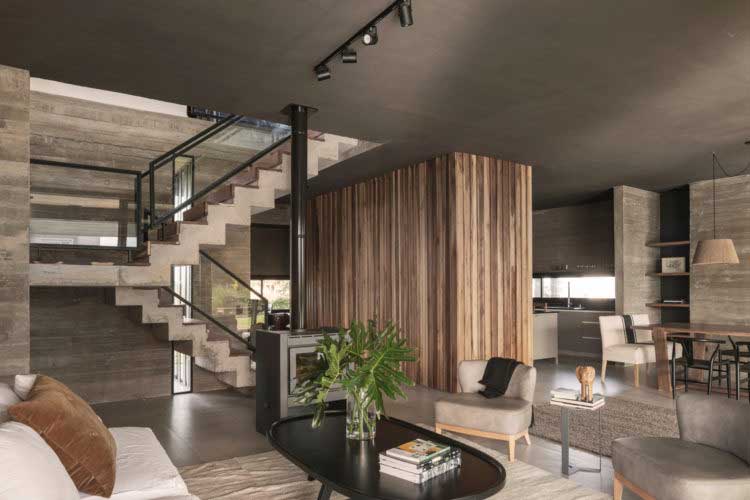 Brick Wall House Combined with Concrete and Wood in the Interior