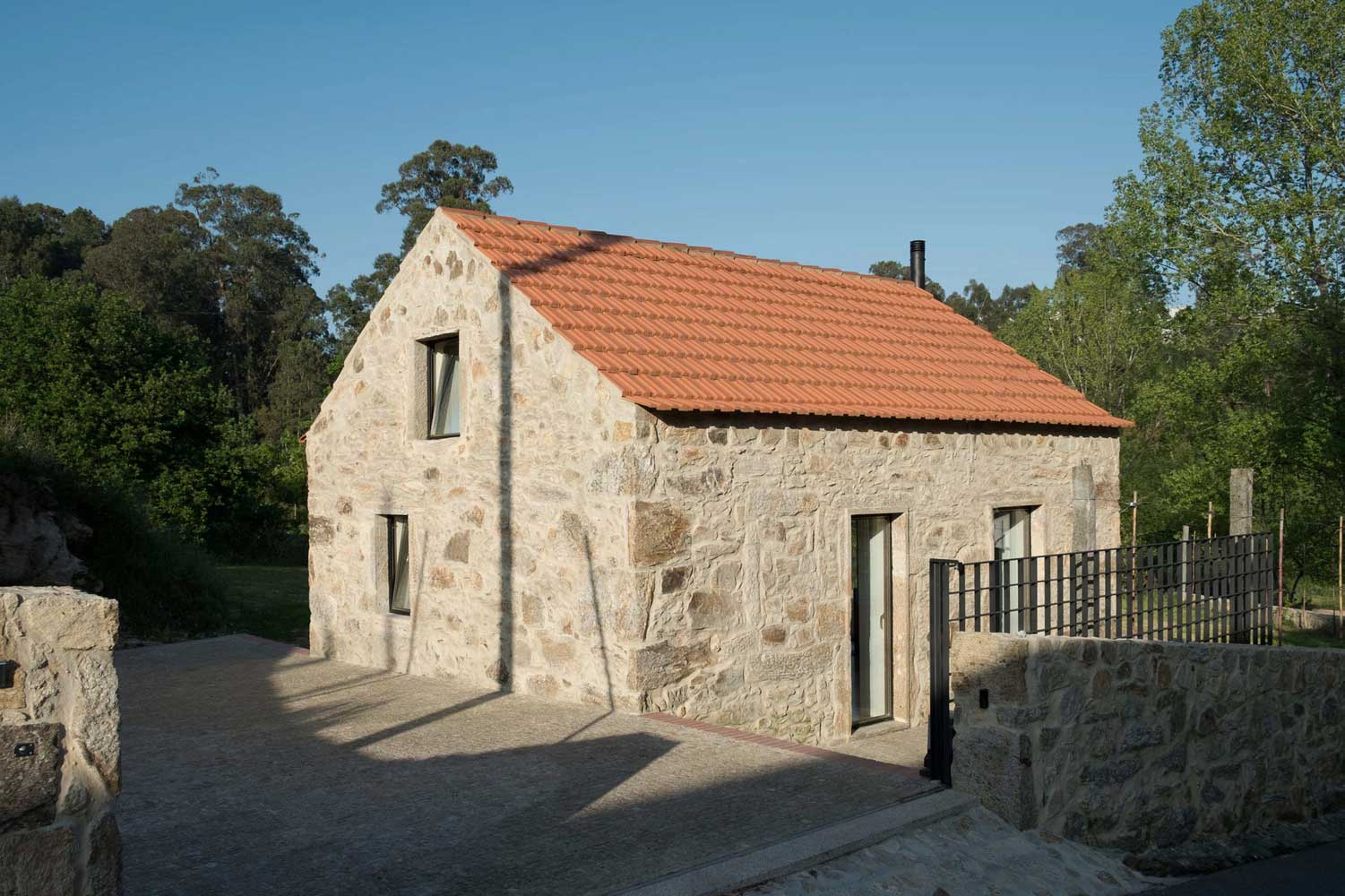 Modern 1 Story Stone House with Attic