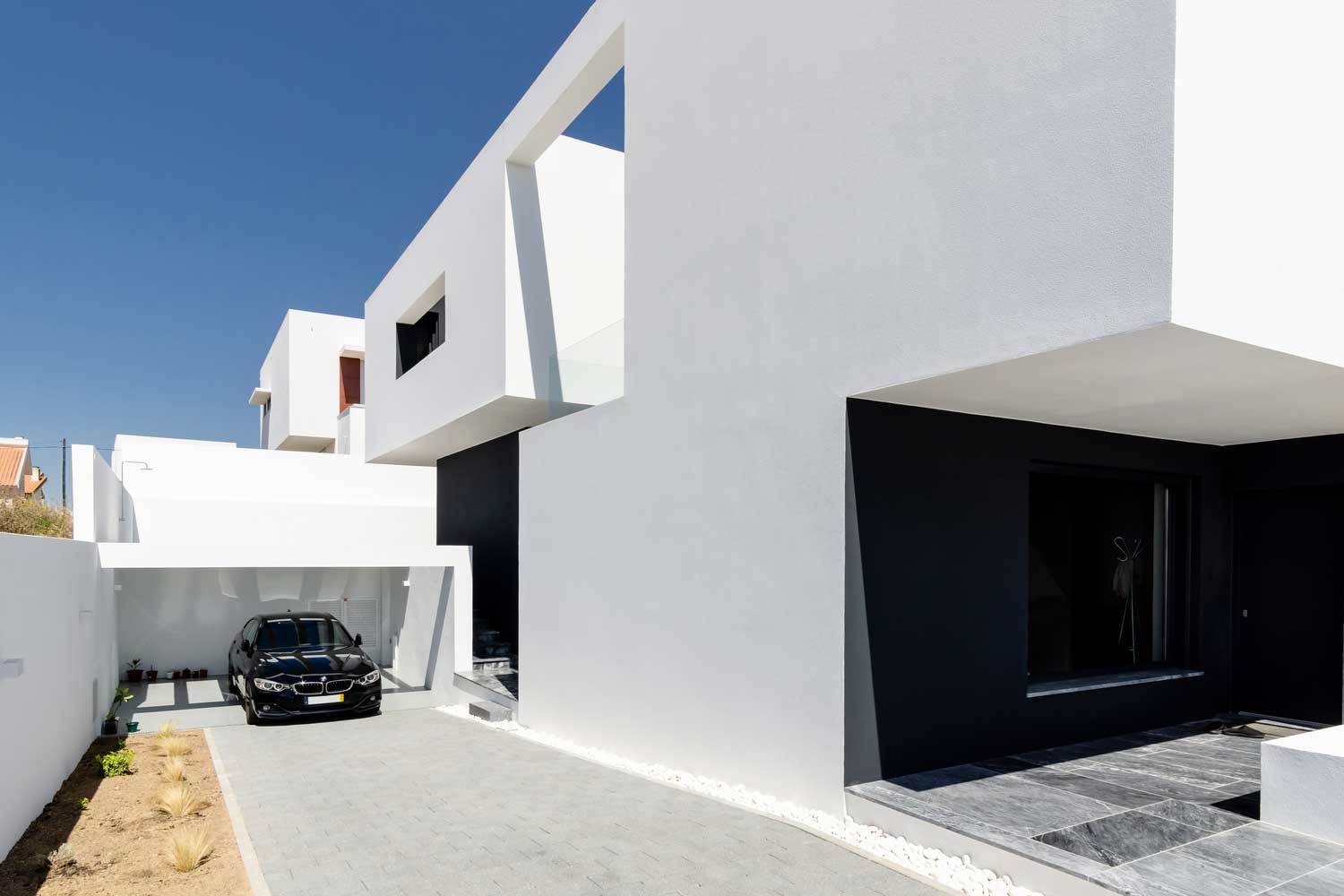 BLACK AND WHITE INTERIOR & EXTERIOR TWO-STORY HOUSE DESIGN