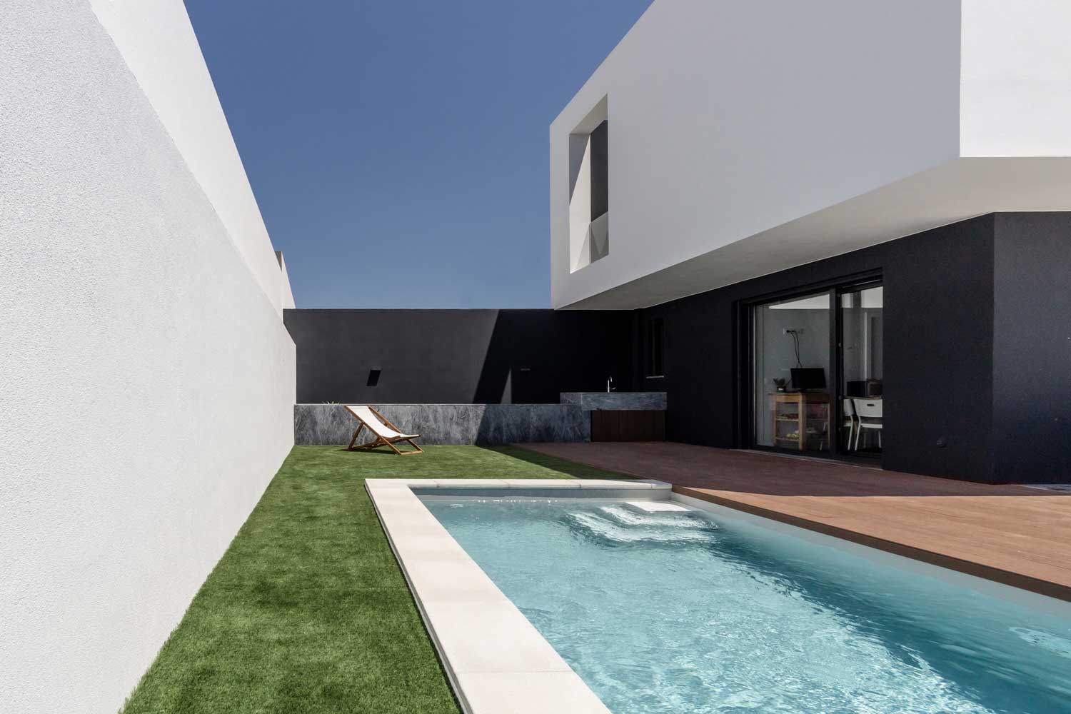 BLACK AND WHITE INTERIOR & EXTERIOR TWO-STORY HOUSE DESIGN