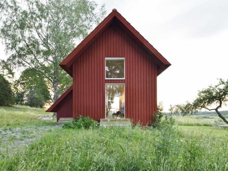 Small Timber Frame House with Red Facade and Roof: images