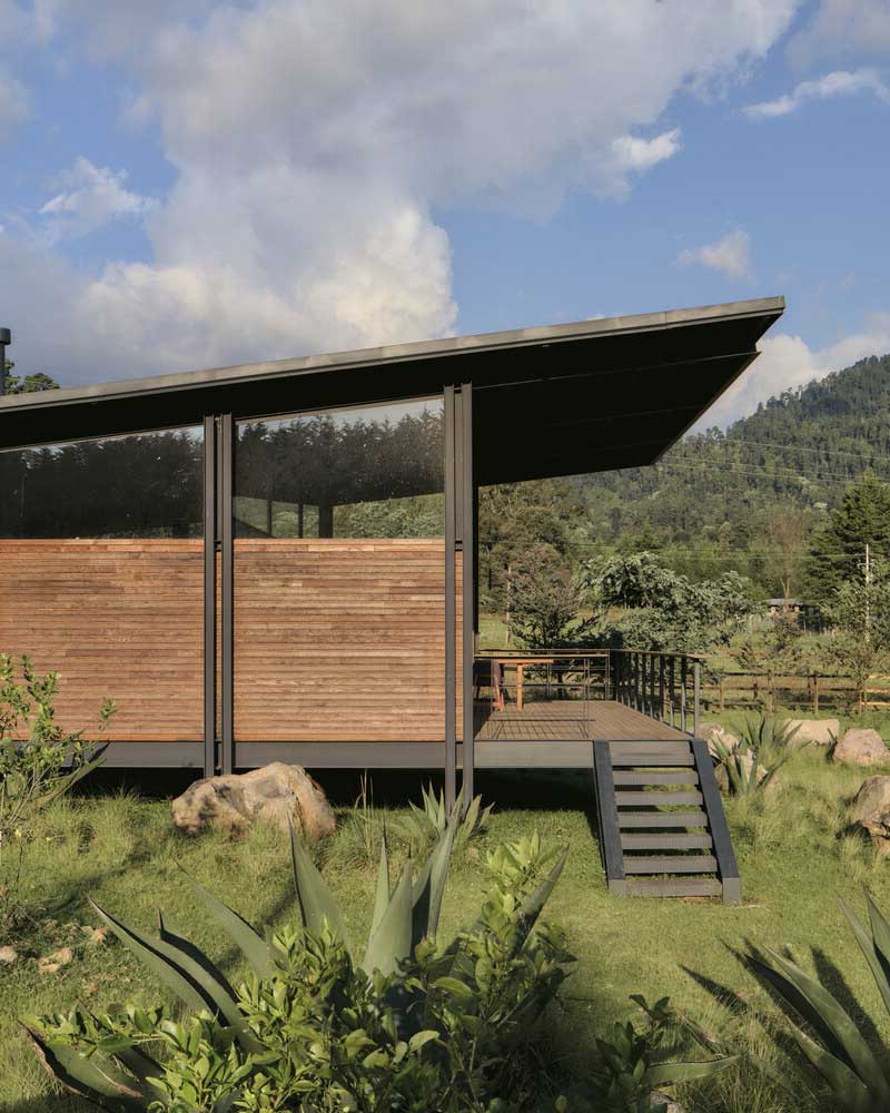 Living the Simple Life: A Steel Frame Cabin with a Porch to Call Home ...