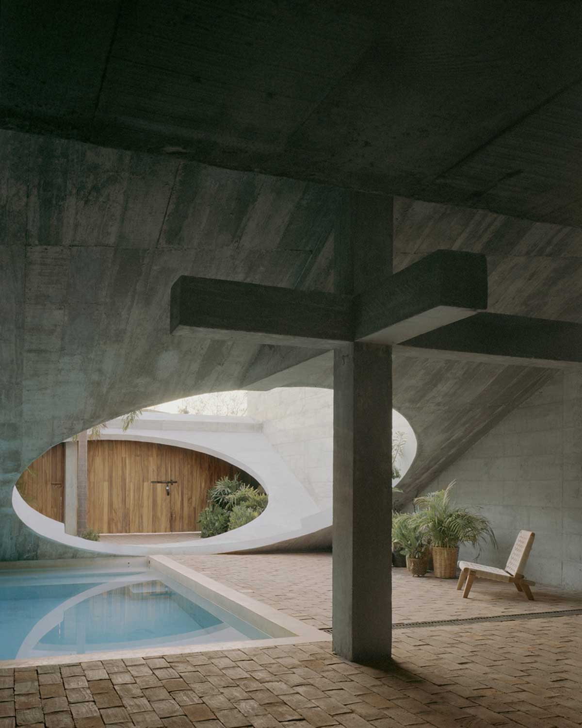 Creating Open Living Spaces with Concrete, Wood, and Natural Light ...