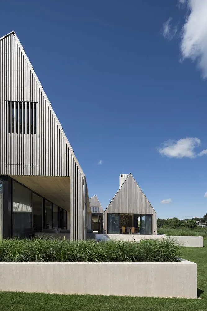 Cedar Shingles Meet Limestone in a Modern Oceanfront Home