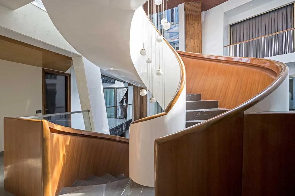 Urban Oasis with Stone Exteriors and Ventilated Courtyards