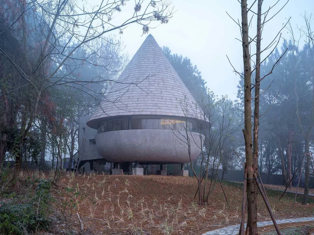 Wood-Clad Cone Roofs and Panoramic Windows in a Forest Retreat