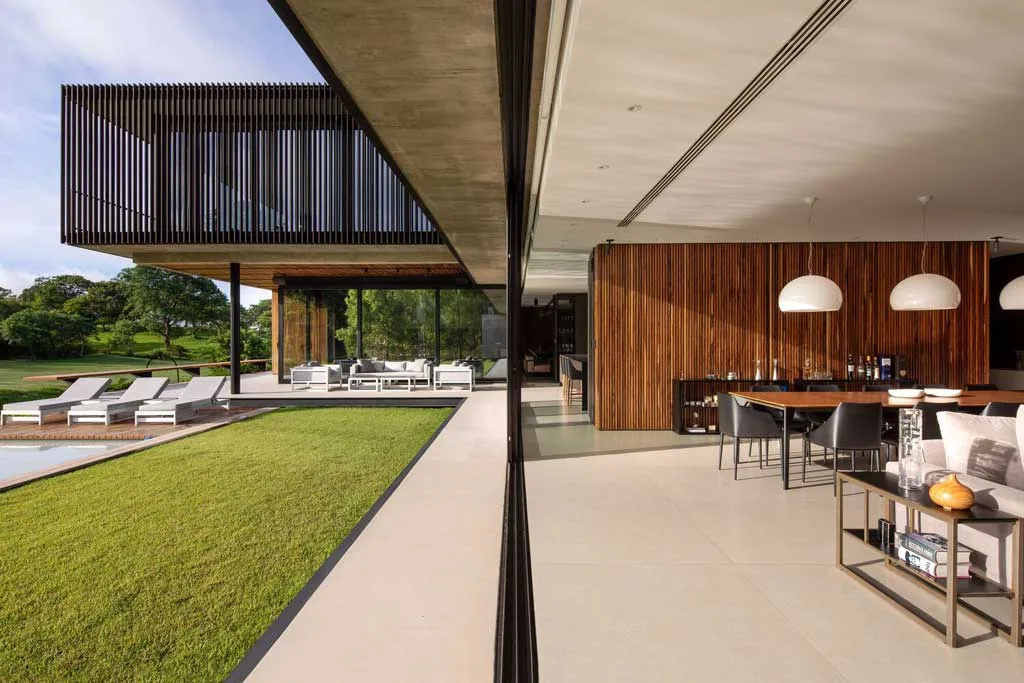 Linear Interior Layout Connecting Living, Dining, and Kitchen Spaces