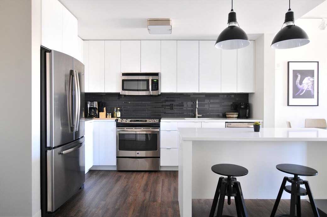 Expert Kitchen Makeover: The Benefits of Cabinet Painting Services