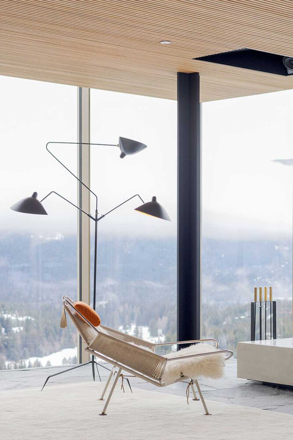 Glass Walls and Floating Structures Shape a Minimalist Mountain Retreat