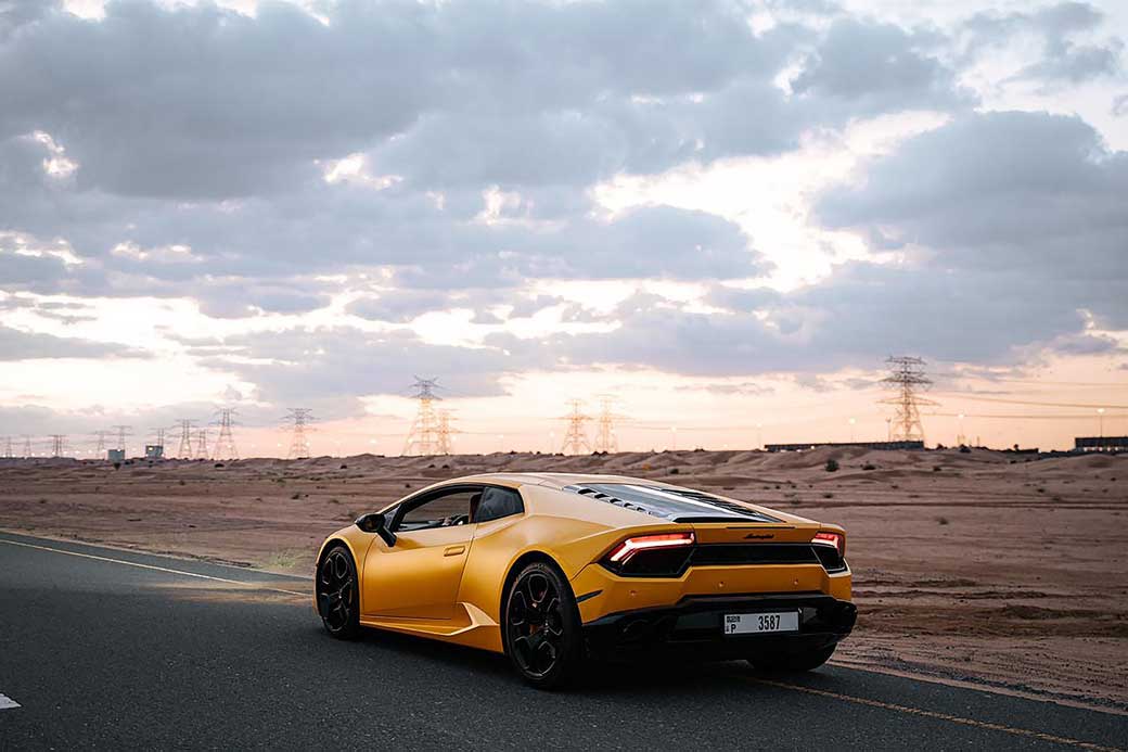 Luxury on the Road: How Students Can Balance Sports Car Dreams with Practical Travel Choices