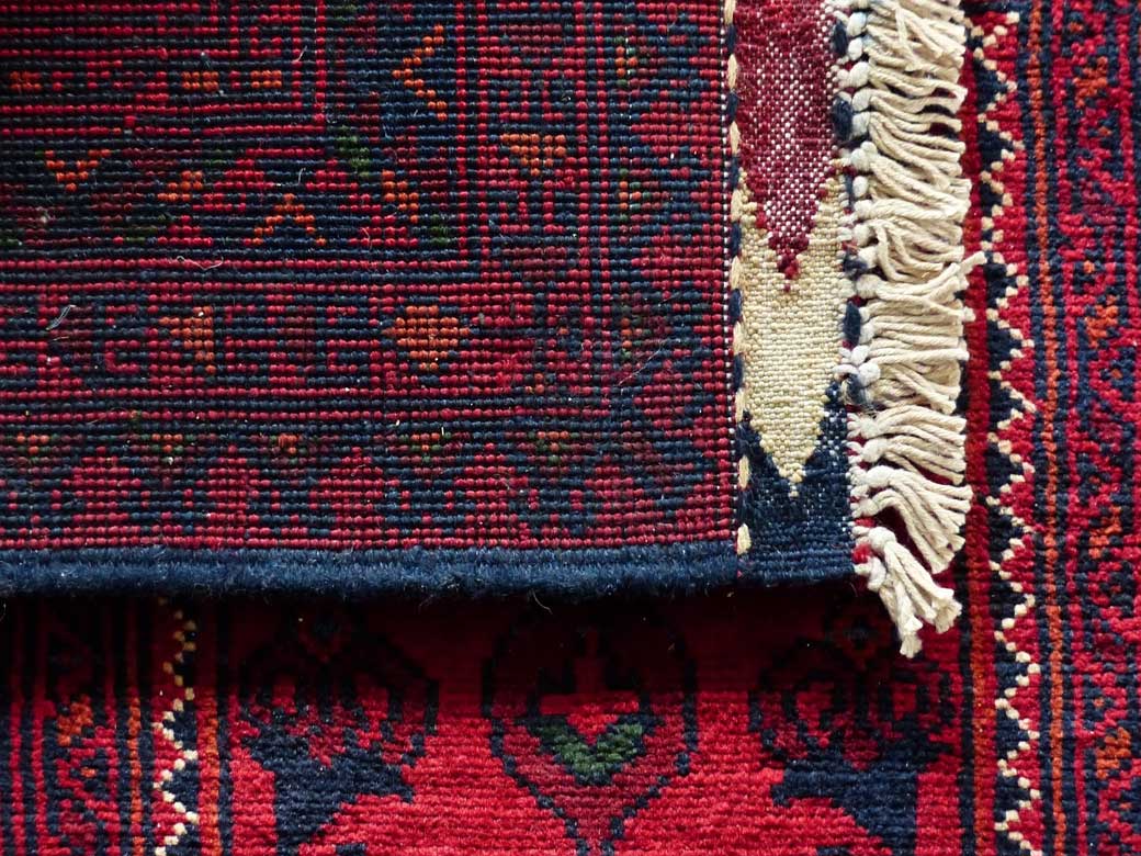 Layering Rugs: Adding Depth and Texture to Minimalist Interiors