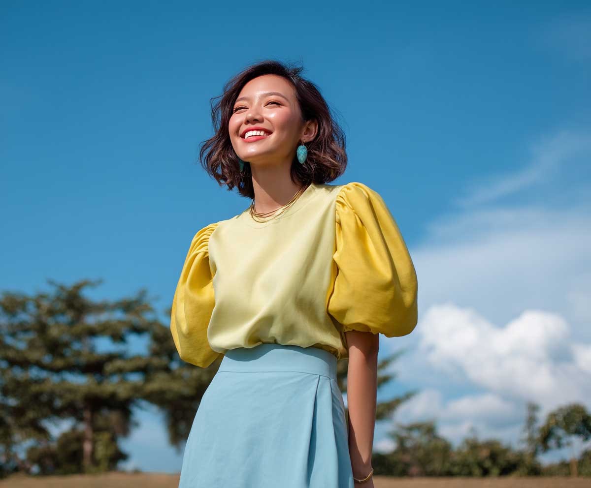 young woman wearing a sky blue midi skirt and a lemon yellow puff sleeve top, standing in a sunny park setting, pastel tones, relaxed and cheerful mood, full-body photo, spring or summer vibe, modest and joyful style, no suggestive clothing