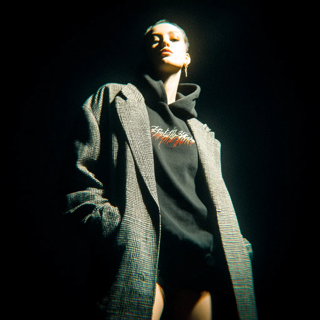 Chic wardrobe styling featuring accessible streetwear and luxury tailoring