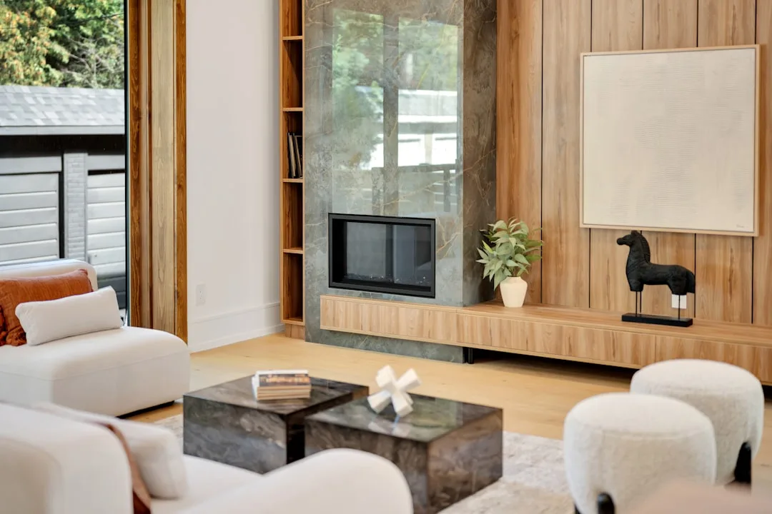 Minimalist cat wall shelving unit mounted beside a linen sofa