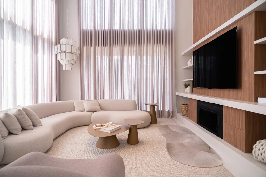 Arched upholstered headboard in soft rounded design for modern bedroom