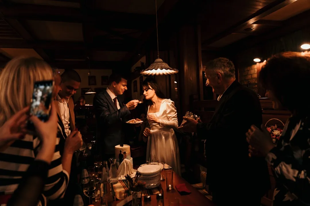 Progressive wedding dining course with candlelight and soft draping décor