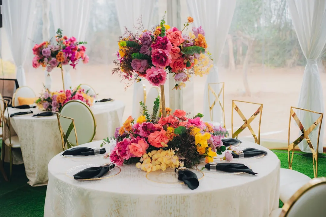 Mismatched patterned bridesmaids dresses in vibrant wedding color palette