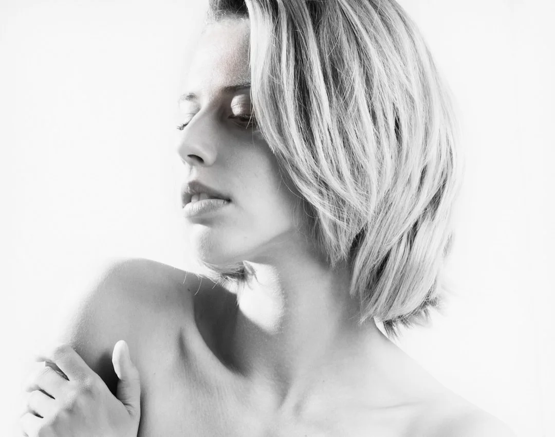 Stylist creating shattered bob with point-cutting technique