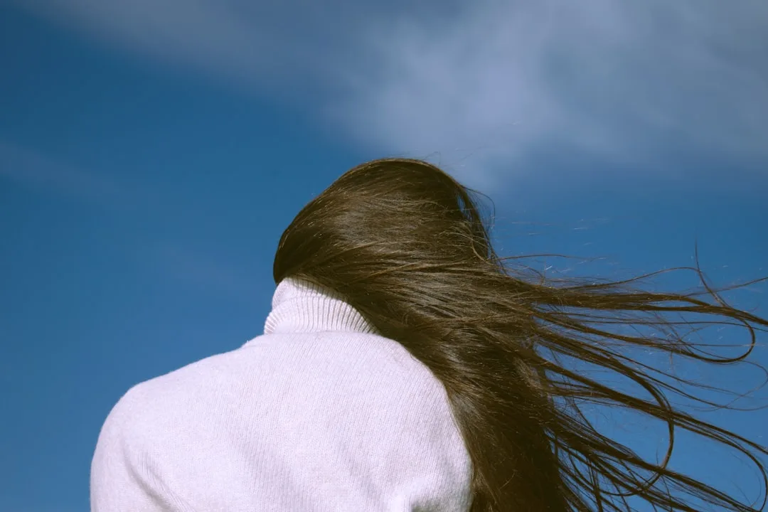 Close-up of ghost layer haircut technique at salon 2026