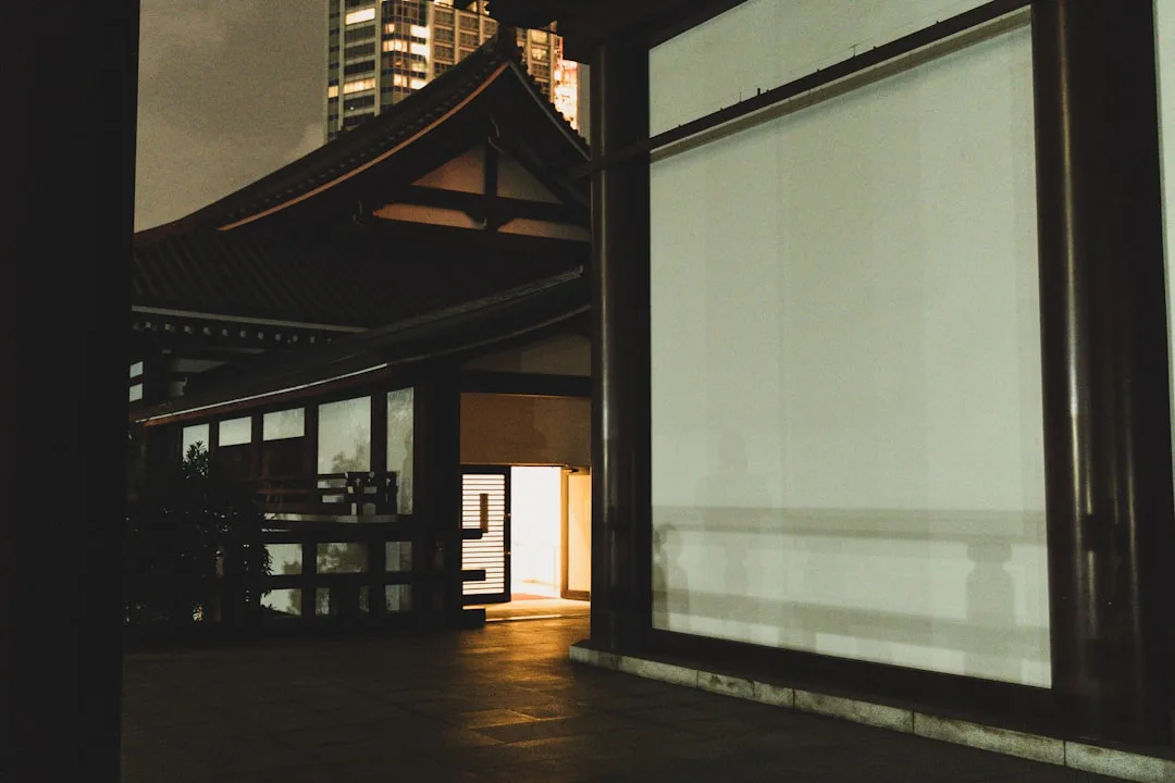 Lutron motorized shade system controlling covered porch screens outdoors