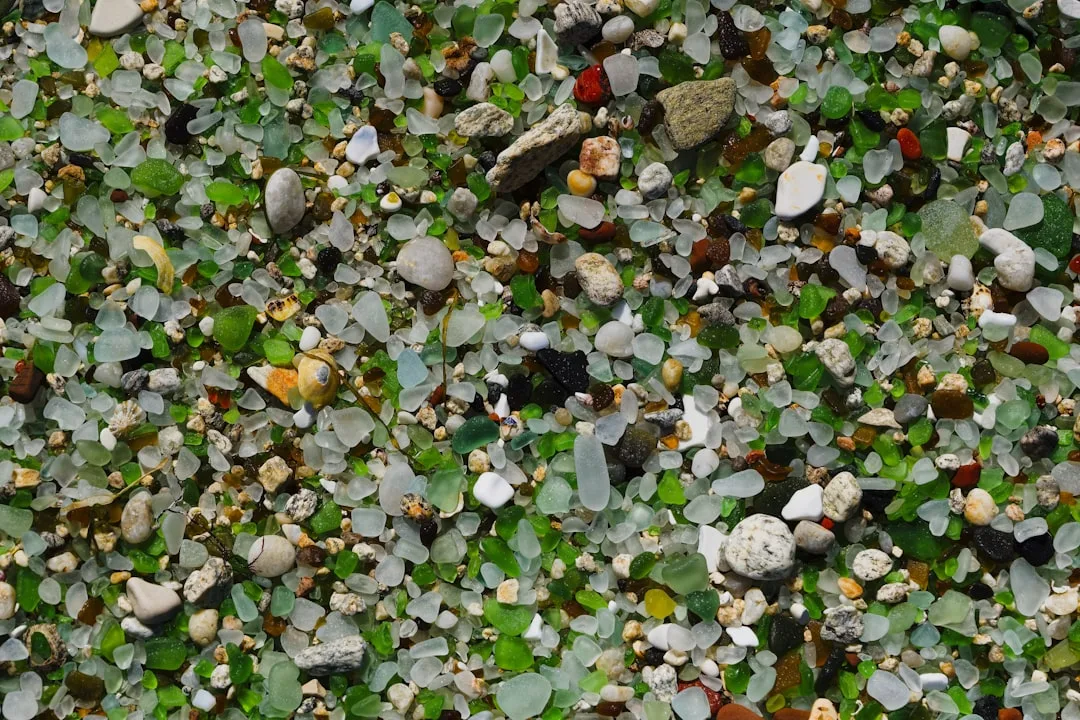 Recycled glass aggregates shimmering in sustainable concrete countertop material detail 1