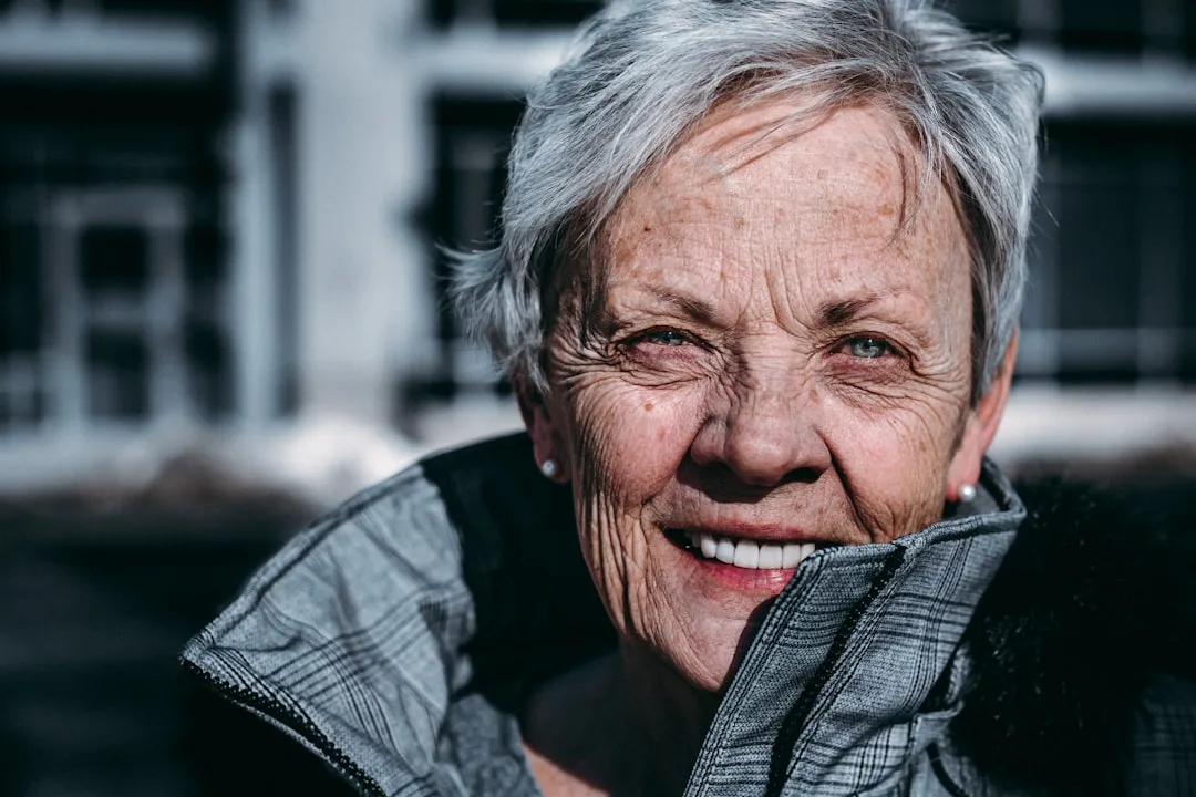 Textured layered hairstyle for older woman with soft dimension