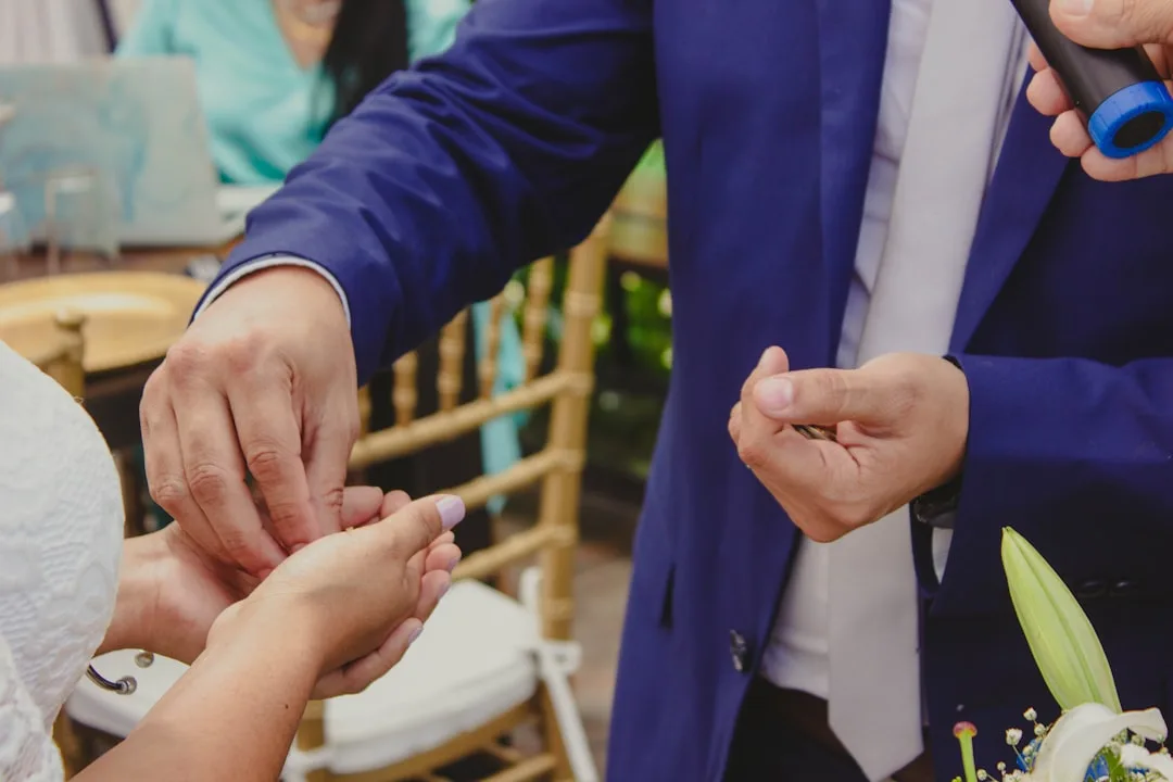 Bride and groom host interactive photo booth with custom backdrop design