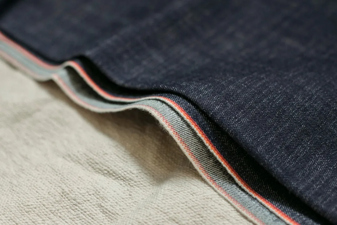 Cone Mills raw denim fabric weave texture close up