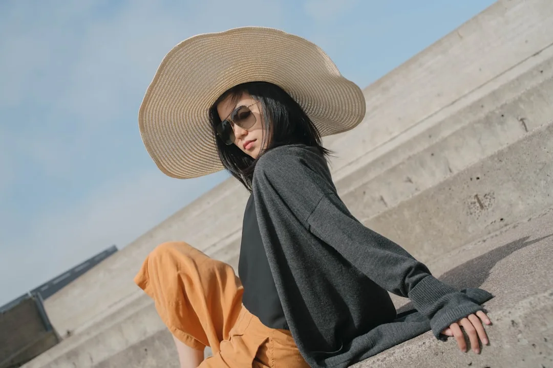 Oversized linen shirt paired with tailored trousers and loafers