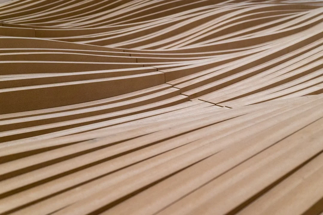 Close-up of walnut veneer application on plywood substrate