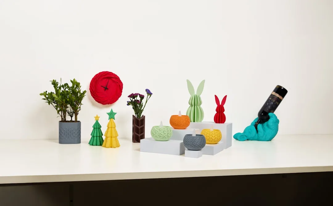 White 3D printed vase with geometric lattice pattern on marble shelf
