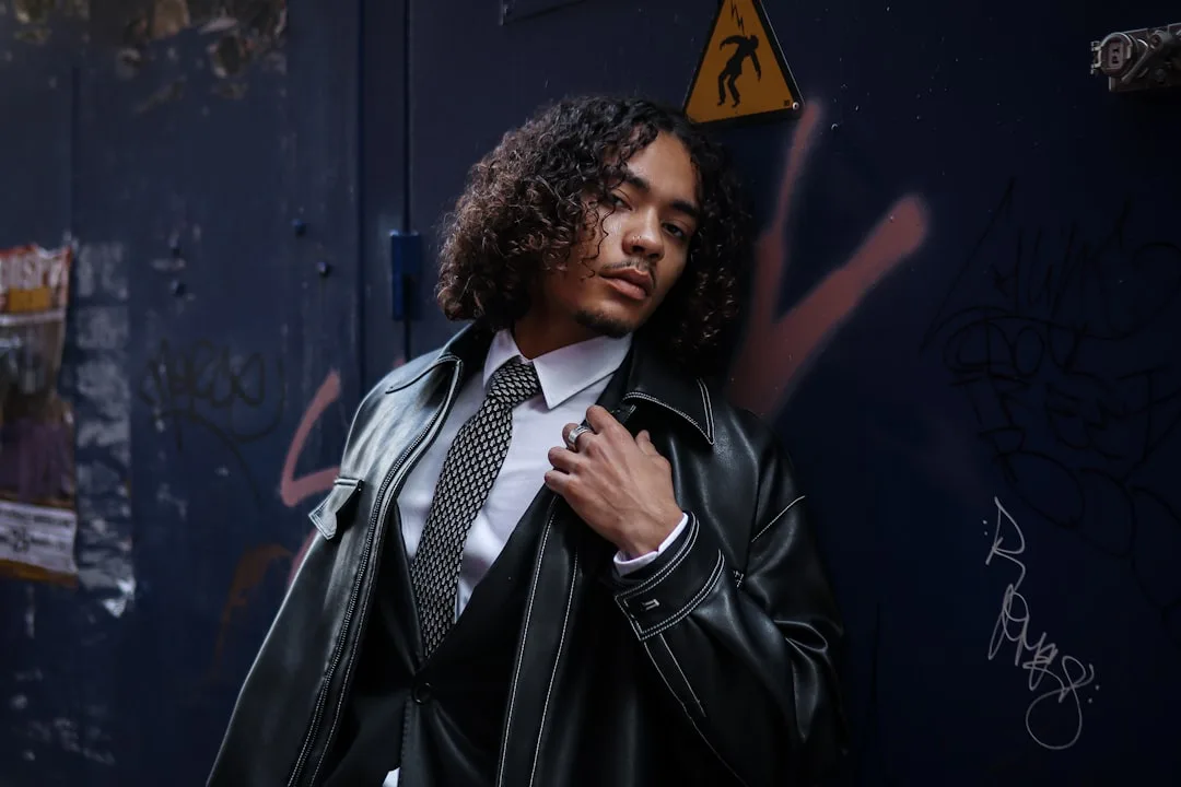 Oversized blazer men paired with fitted trousers monochromatic