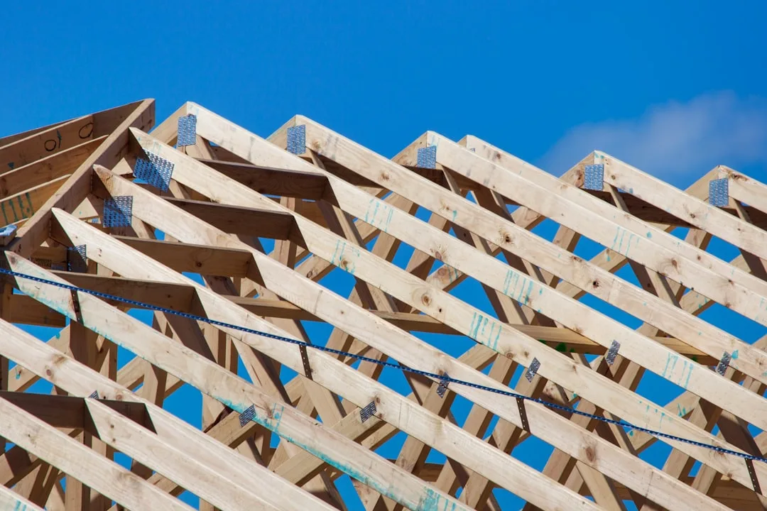CLT panels stacked showing perpendicular grain layering structural strength method