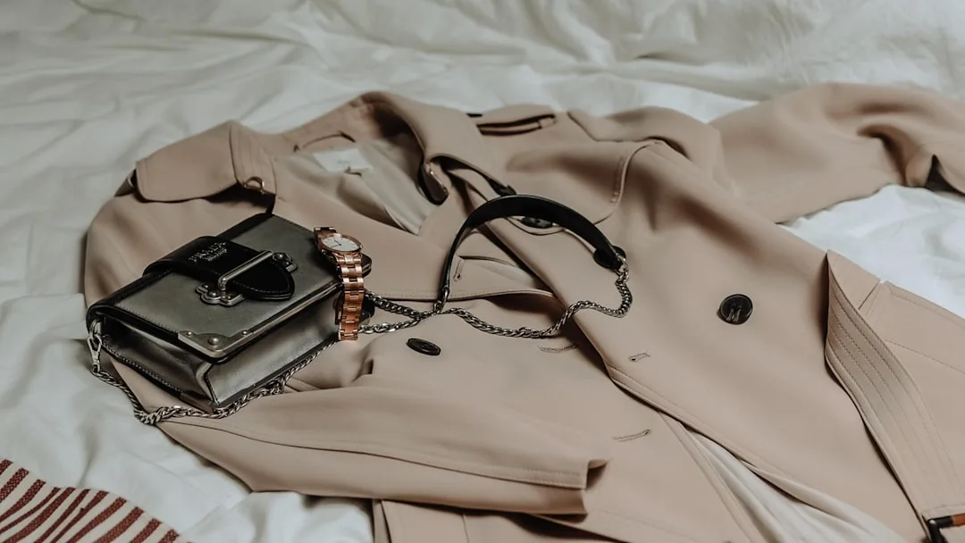Woman wearing neutral tones fashion beige layers over cream base detail 4