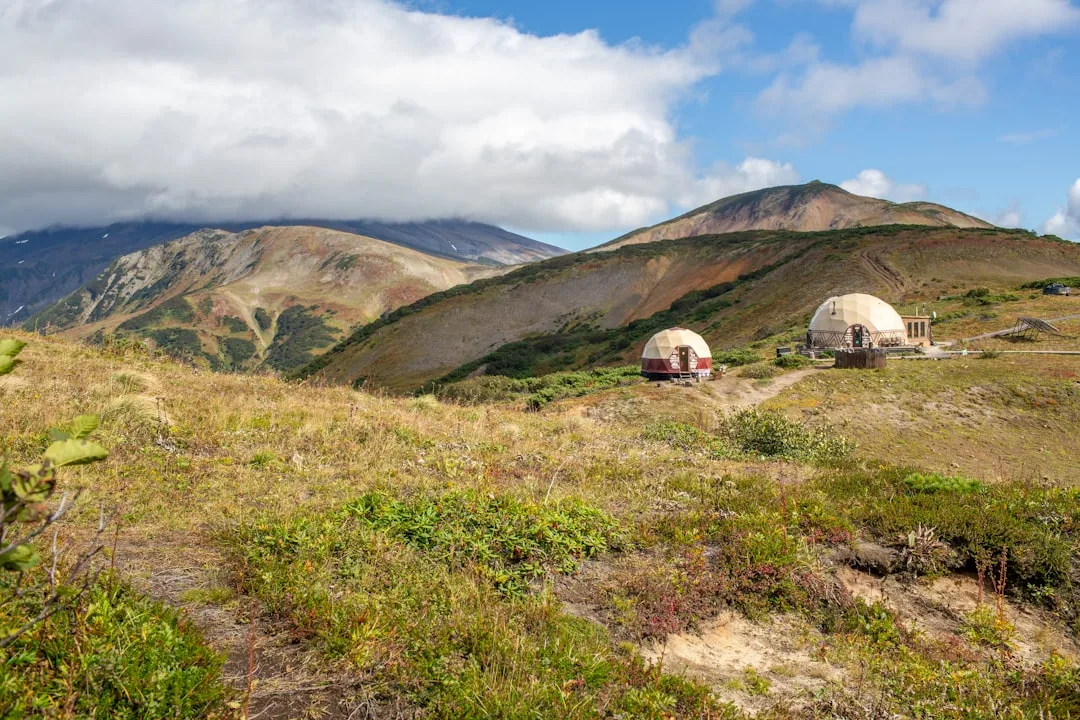 Modern sustainable travel accommodation with eco-certified design and natural materials detail 3