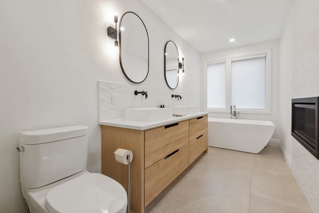 Luxury bathroom with radiant heated flooring system installed beneath marble tile detail 1