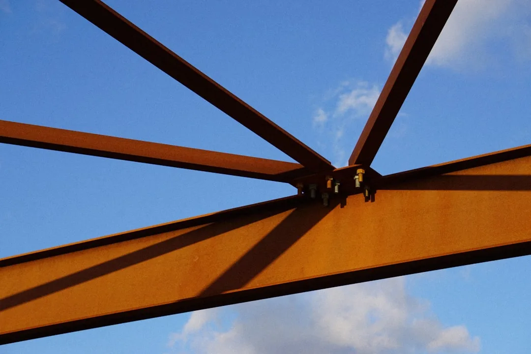 Biophilic shade structure with integrated climbing vines and wooden slats