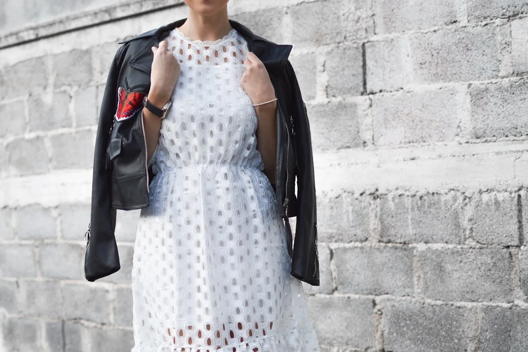 Leather jacket styled with minimalist accessories spring outfit