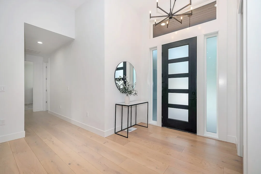 Close-up of acoustic glass interior door showing laminated interlayer construction