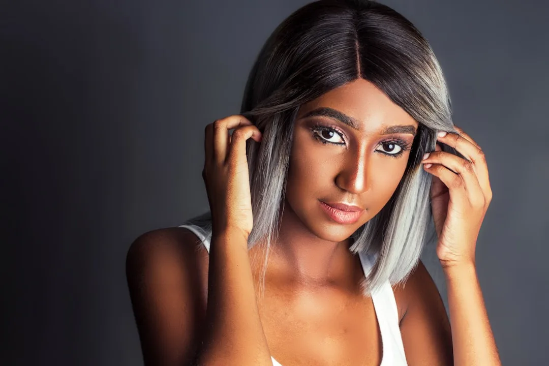 Grown-out root hair trend showing intentional shadow roots at scalp detail 2