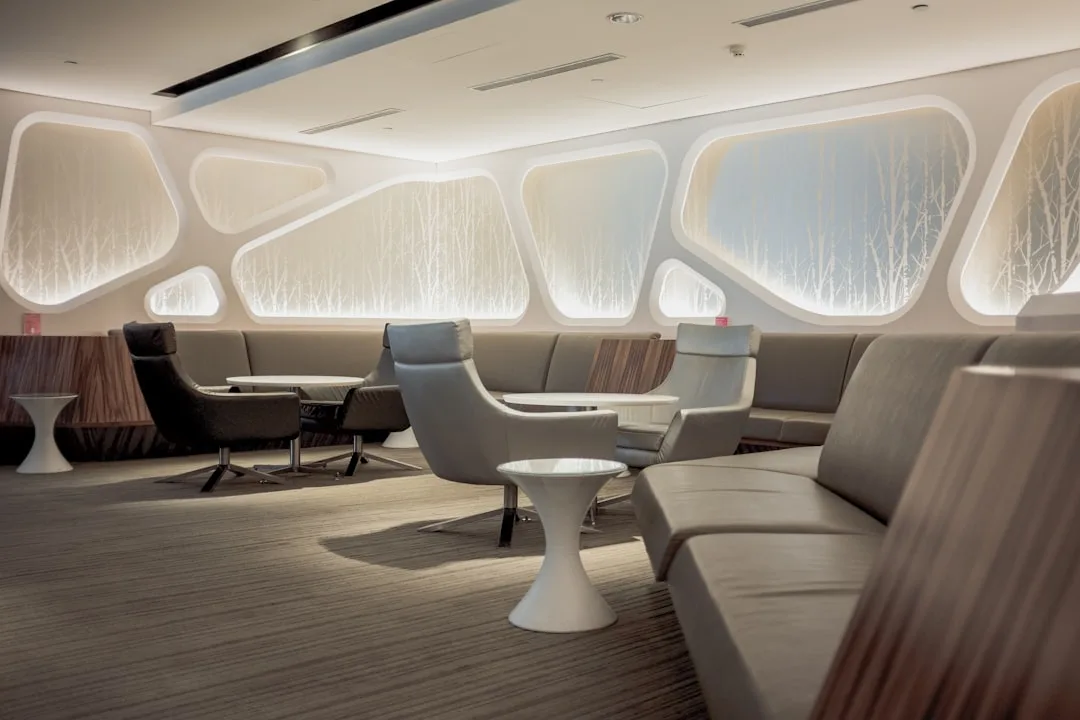 Modern airport lounge with comfortable seating and priority access for travelers detail 2