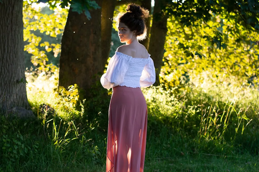 Maxi skirt outfit pairing elongated fabric with structured accessories