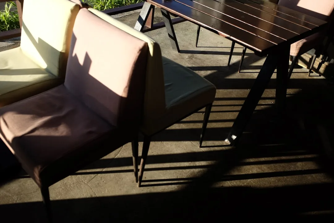 Patio furniture with Peachy fabric showing stain resistance demonstration