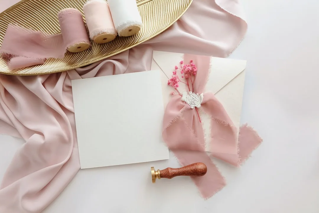 Luxe handwritten invitation with burgundy wax seal and calligraphy addressing detail 3