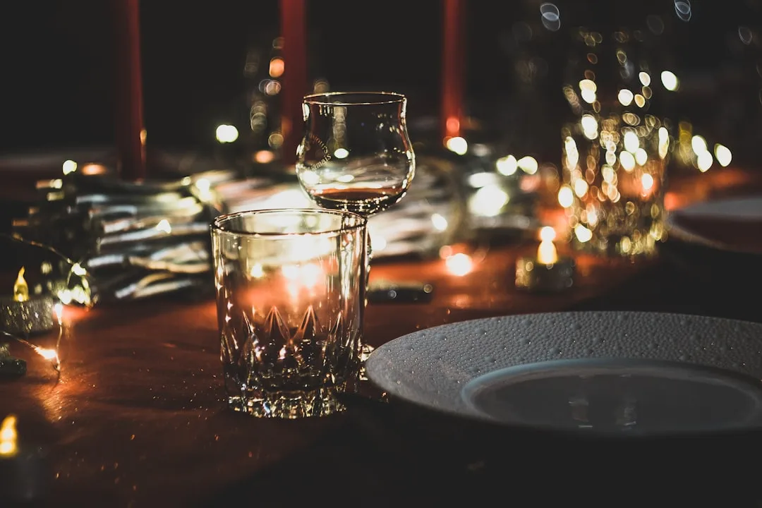Intimate celebration events with candlelit table and curated guest list detail 4