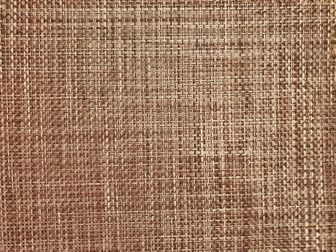 Japanese linen wall panels with natural woven texture in modern bedroom detail 4